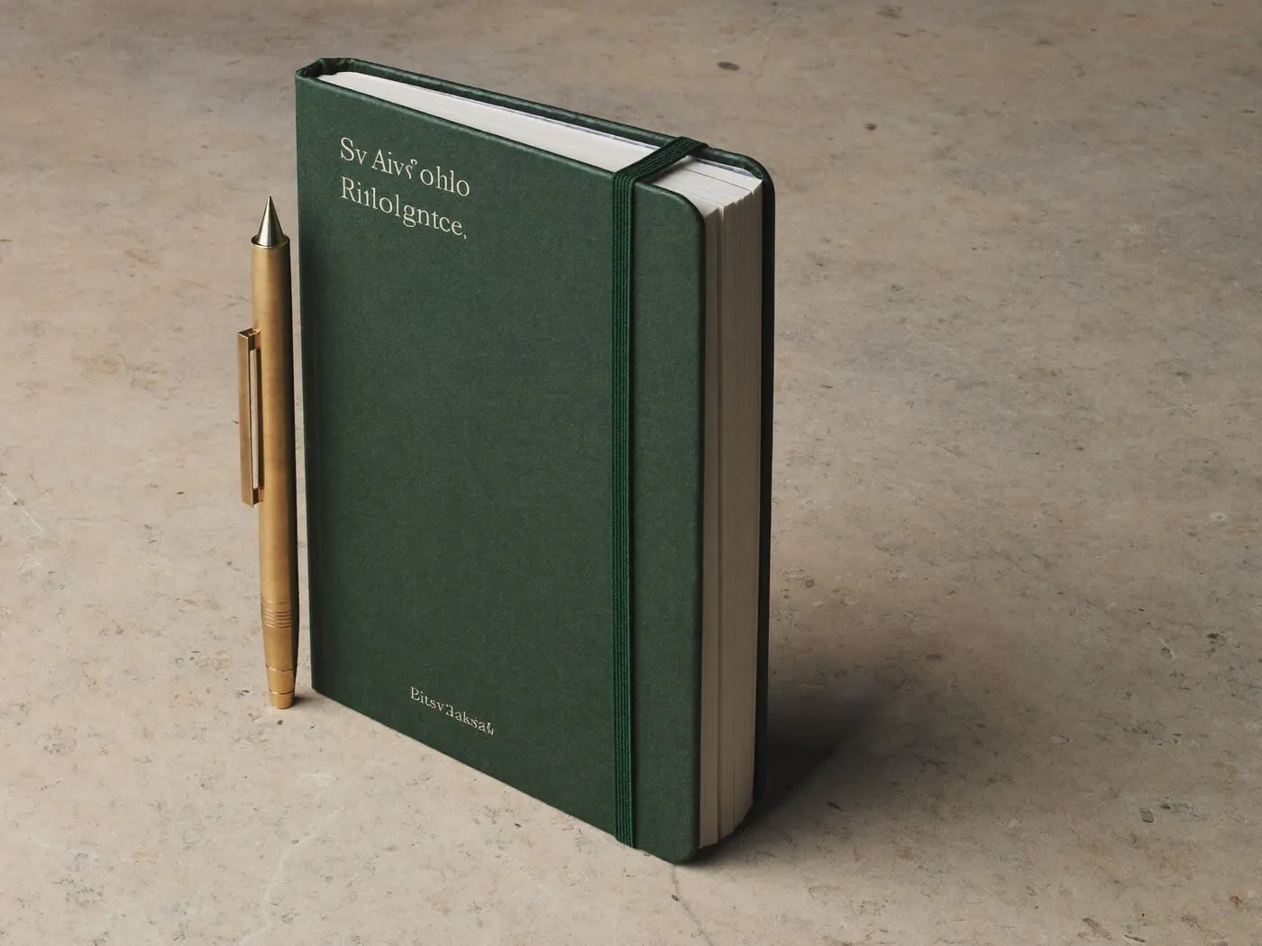 A green notebook, shot as a product still